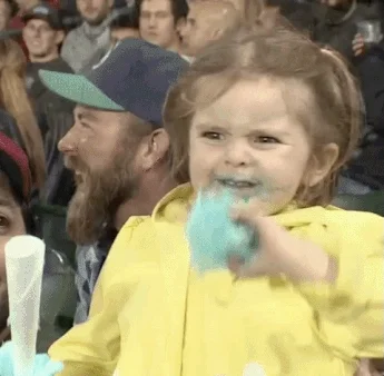 excited girl eating cotton candy gif